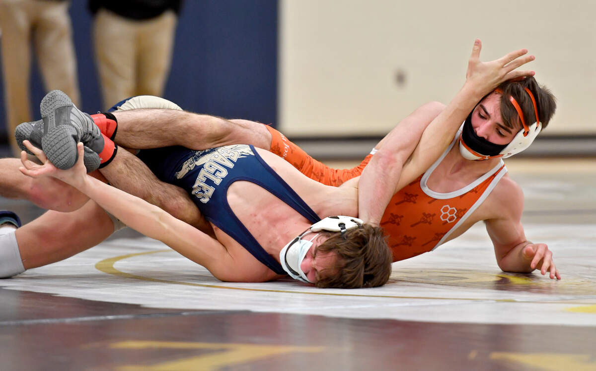 Saint Joseph’s Amonn Ohl controls Bald Eagle Area’s Mason Resse in a 138 lb bout during the District 6 AA section 2 tournament on Wednesday, Feb. 17, 2021.