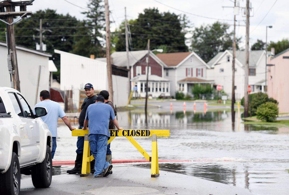 East Alder Street is closed due to flooding Tuesday, Sept. 11, 2018 in Philipsburg.