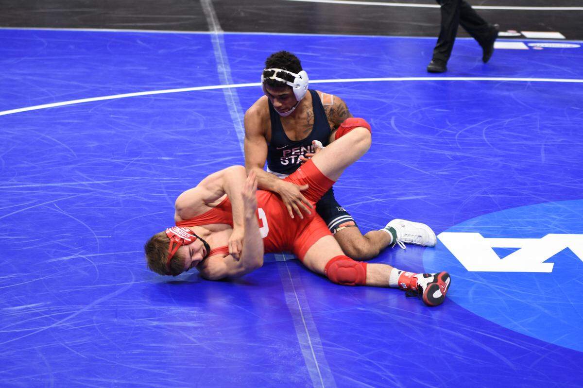 Penn State’s Roman Bravo-Young controls Cornell’s Dominic LaJoie in their 133-pound first round match of the NCAA Championships on Thursday, March 17, 2022 at Little Caesar’s Arena in Detroit. Bravo-Young defeted LaJoie, 16-4.