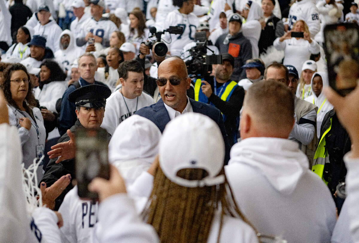 Penn State football coach James Franklin greets fans as he arrives for the White Out game against Iowa on Saturday, Sept. 23, 2023.