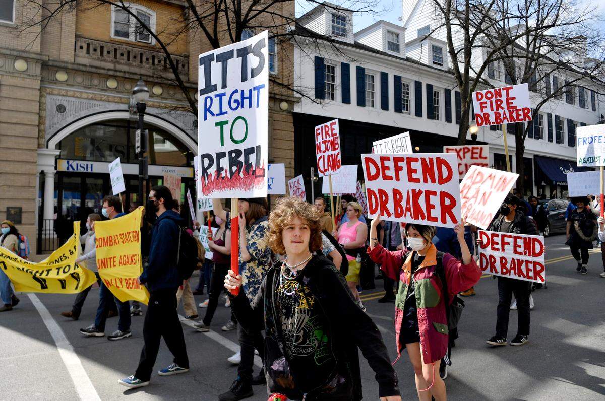 Students gathered and marched across the Penn State campus and downtown State College in support of professor Oliver Baker on Thursday, March 24, 2022.