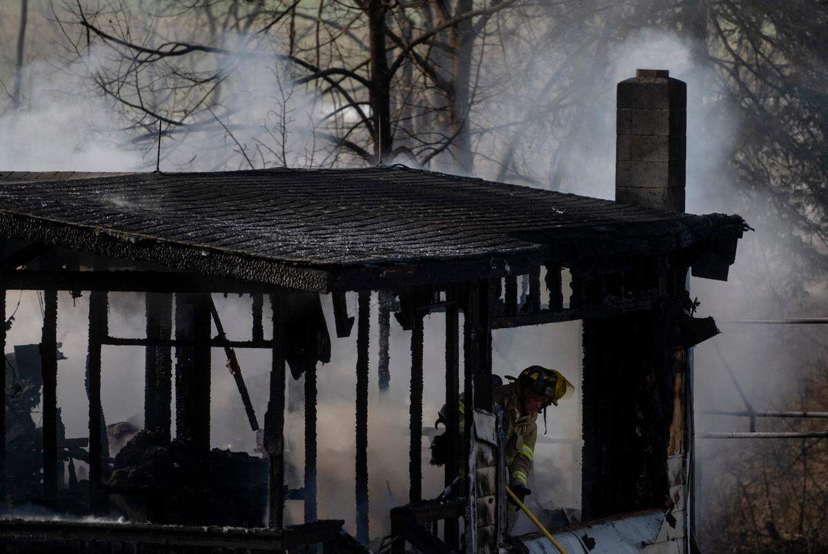 Firefighters respond to a fire at home on the 4000 block of Nittany Valley Drive in Walker Township on Tuesday, Dec. 20, 2022.