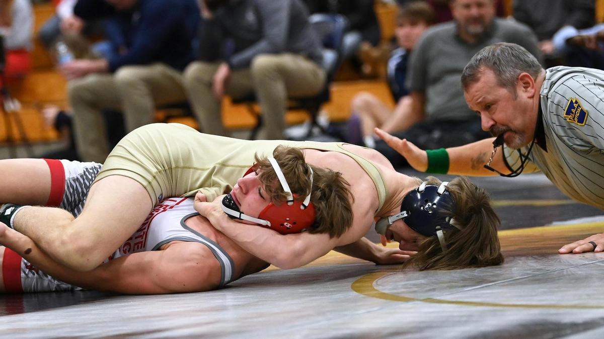 Bald Eagle Area’s Coen Bainey looks to pin Bellefonte’s Jackson Long in their 127-pound final of the Big 7 Tournament on Saturday, January 21, 2023. Bainey did pin Long in 1 minute, 21 seconds.