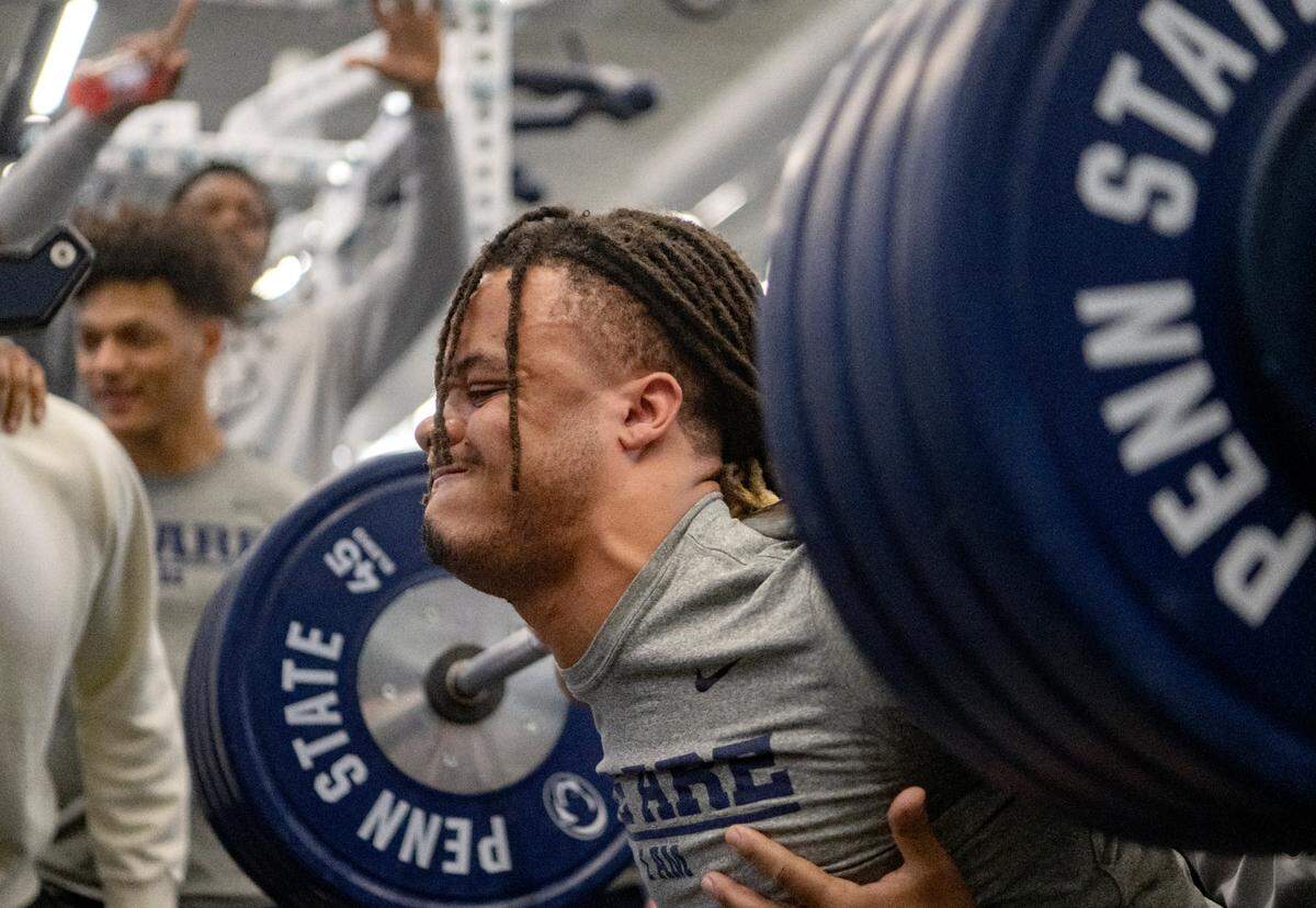 Penn State safety Jaylen Reed squats during a max-out lifting session on Thursday, March 2, 2023.