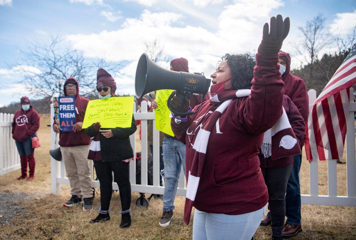 Mirna Gonzalez leads a chant during rally by CASA at Cold Stream Dam and Recreation Park on Thursday,