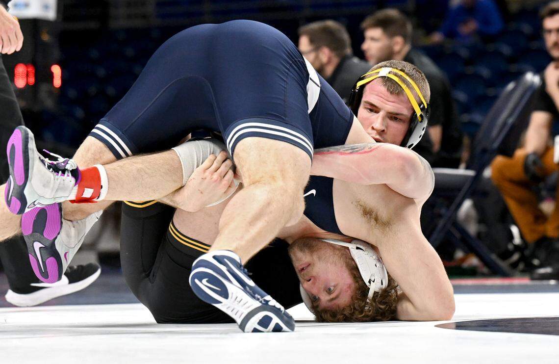 Penn State's Cole Mirasola wrestles Iowa’s Ben Keuter in a 285-pound bout during the Big Ten wrestling championships at the Bryce Jordan Center on Sunday, March 8, 2026.