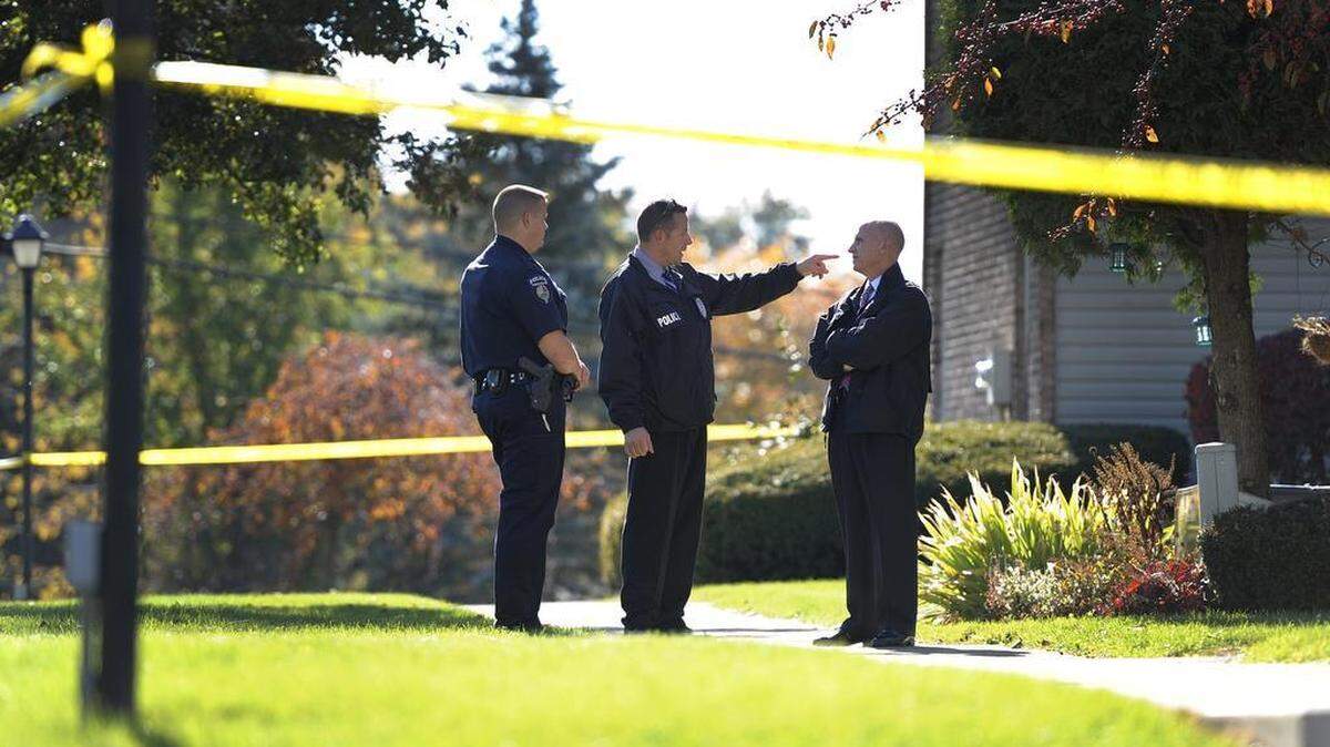 Police officers investigate an incident on Gerald Street in College Township on Oct. 26. Vladimir Podnebennyy, 63, will appear in Centre County court on Wednesday for his preliminary hearing. He is charged with first- and third-degree murder, felony aggravated assault and misdemeanor possession of an instrument of crime in the Oct. 26 stabbing of his wife, Natalya Podnebennaya, 58, in her car in the parking lot of their College Township home. 
