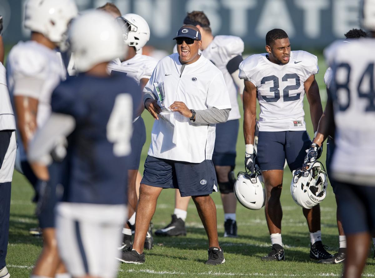 Penn State running backs coach Ja’Juan Seider yells to his players during practice on Wednesday, Aug. 29, 2018.