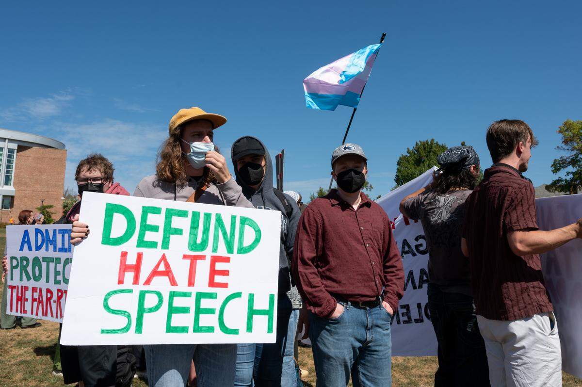 Counter protesters stand on HUB Lawn in response to Charlie Kirk’s “You’re Being Brainwashed Tour” on Thursday, Sept. 19, 2024.