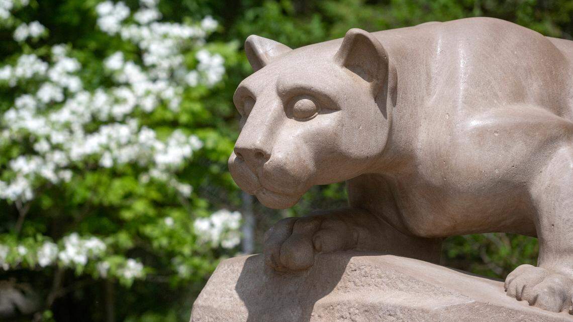 Flowers bloom around the Nittany Lion shrine on the Penn State campus on May 11, 2023.  