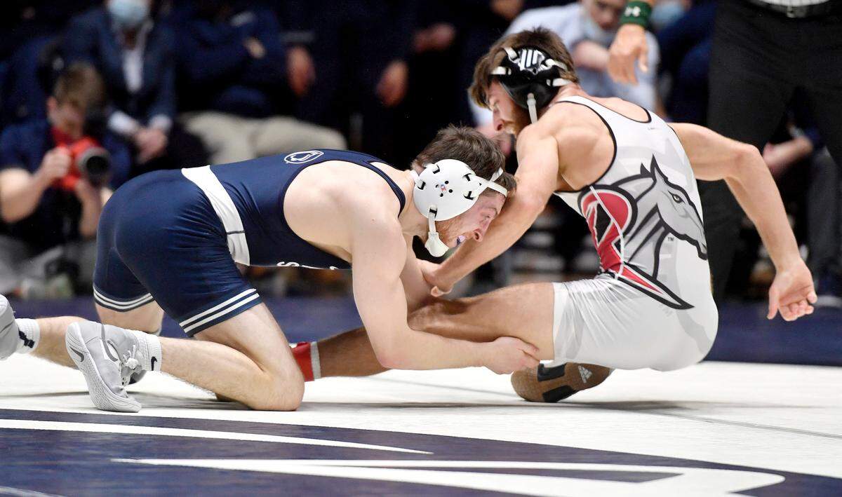 Penn State’s Nick Lee wrestles Rider’s Quinn Kinner in the 141 lb bout of the match on Sunday, Feb. 20, 2022.