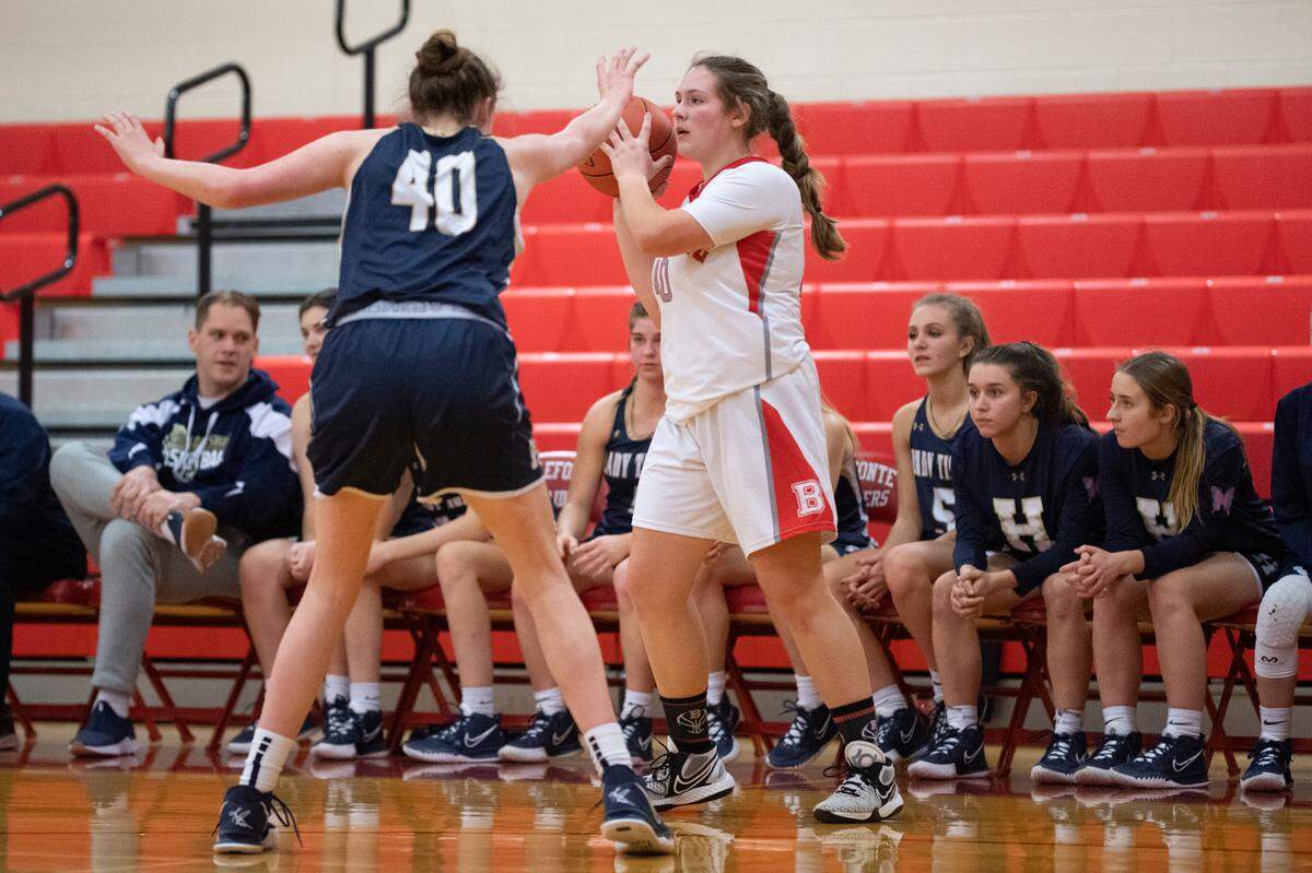 Keira Whitman looks for a pass during a girls basketball game on Friday where Bellefonte Area High School faced Hollidaysburg.