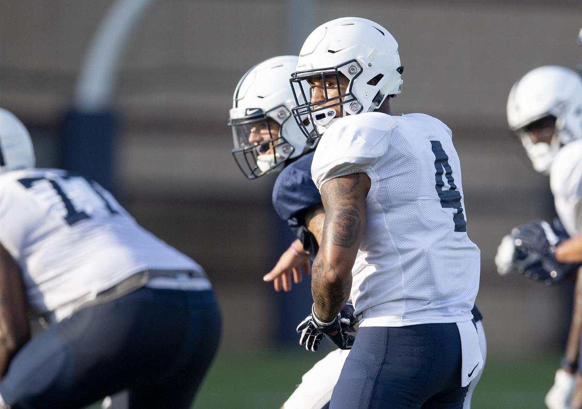 Penn State running back Ricky Slade checks back before a play during practice on Wednesday, Aug. 29, 2018.