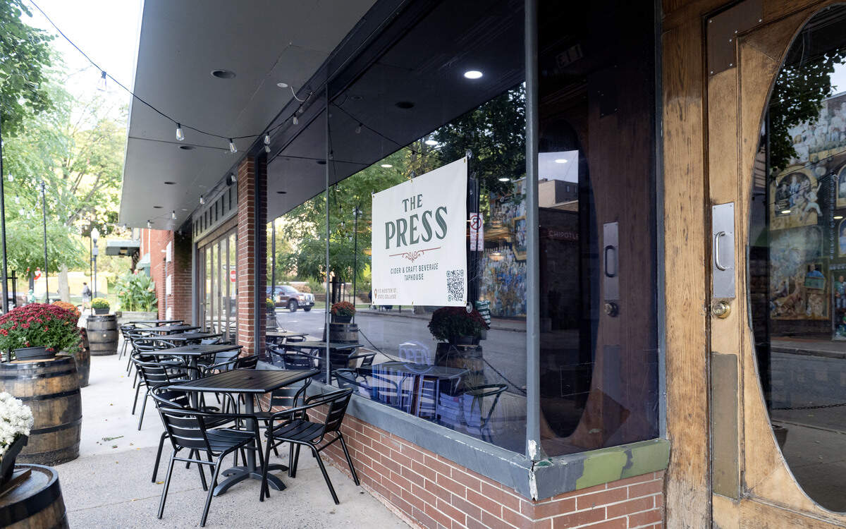 There are several tables for outdoor seating at The Press Cider and Craft Beverage Taphouse at 113 Hiester Street in State College.  
