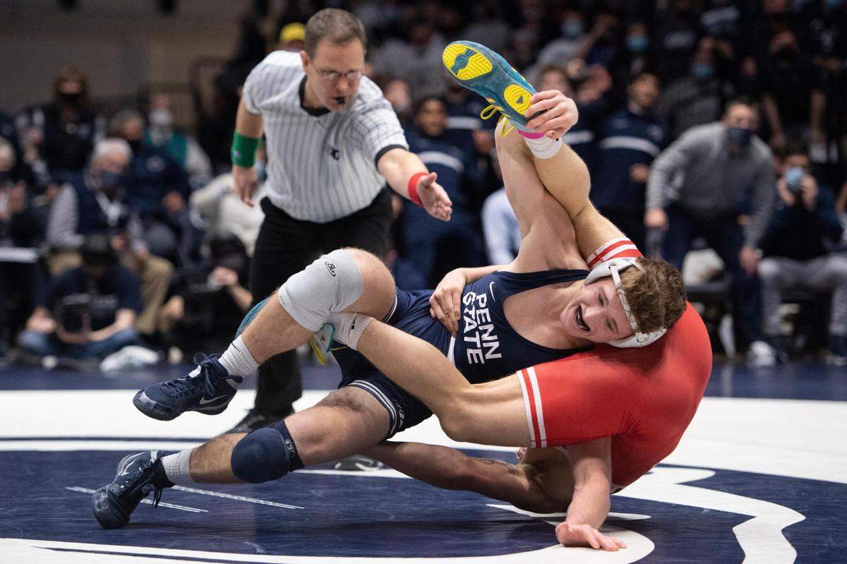 Penn State’s Terrell Barraclough wrestles Nebraska’s Peyton Robb during an NCAA wrestling dual between No. 1 Penn State and No. 8 Nebraska at Rec Hall on Sunday. Penn State defeated Nebraska 21-13 and claimed the Big Ten Regular Season Dual Meet Championship.