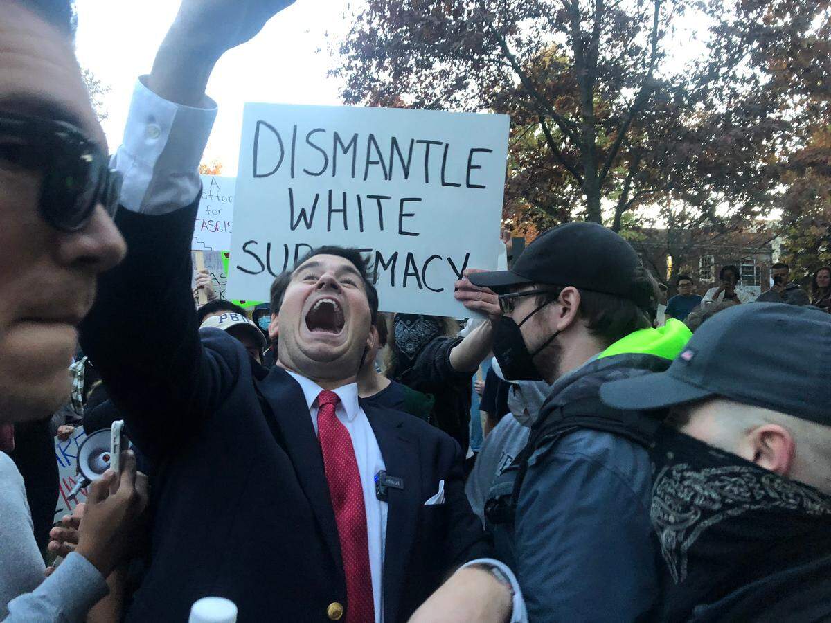 Self-proclaimed professional troll Alex Stein arrives at the Thomas Building on Monday ahead of his scheduled event, which was later canceled.