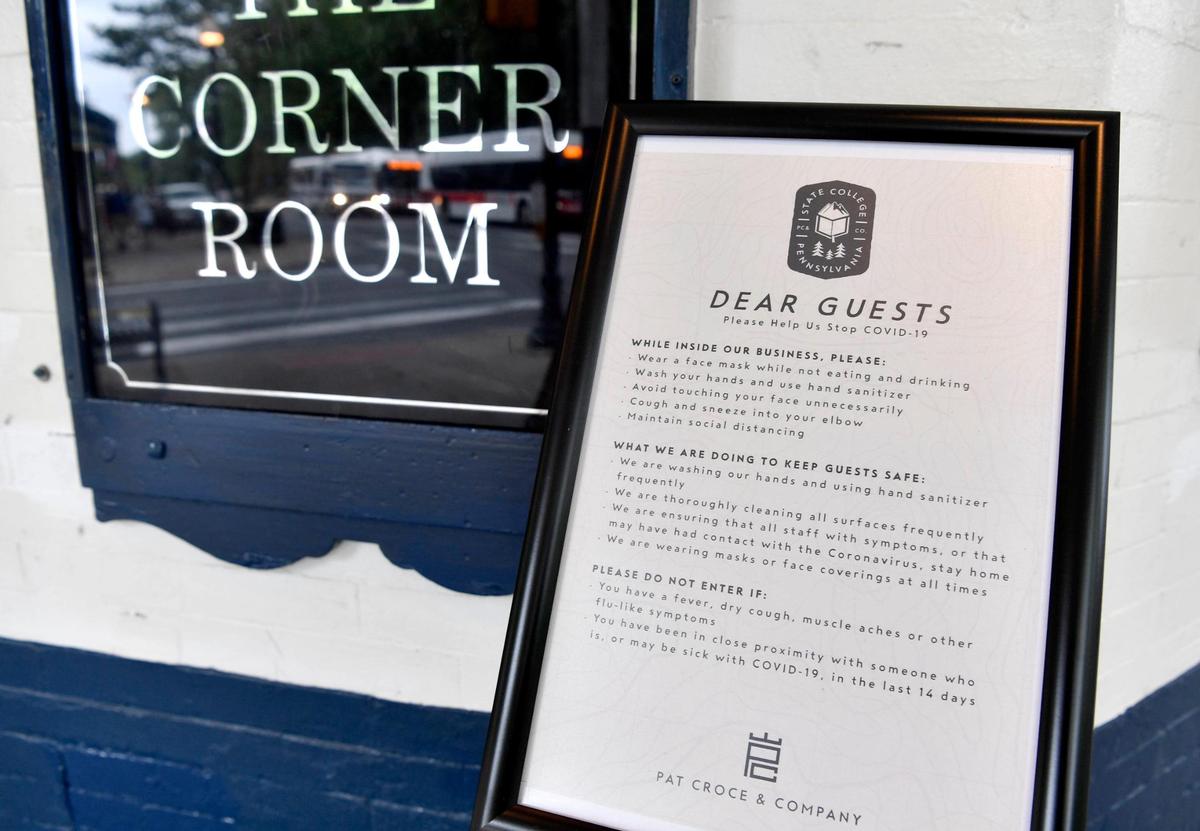 A note outside of the Corner Room and all Hotel State College establishments that are open reminds patrons of the COVID-19 precautions.