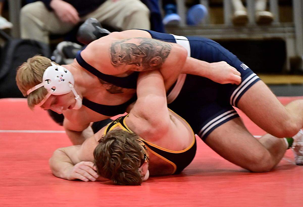 Penn State’s Josh Barr looks to score nearfall points on Missouri’s Jesse Cassatt in their 197-pound bout of the Nittany Lions’ 41-3 win on Sunday. Barr pinned Cassatt in 1:45.