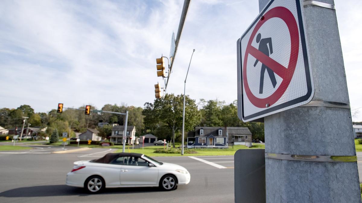  A no pedestrian sign at the intersection of East College Avenue and Elmwood Street in State College on Tuesday, Oct. 16, 2018.