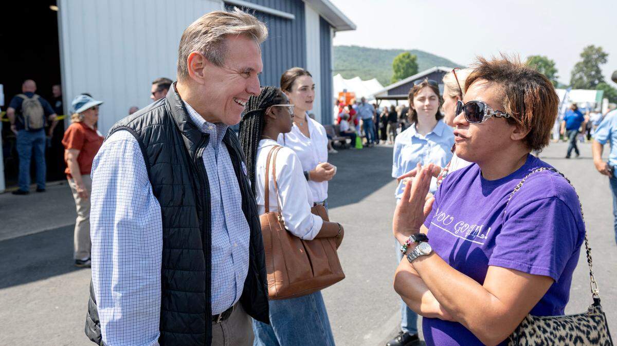 Rep. Paul Takac talks with visitors at at Penn State’s Ag Progress Days on Wednesday, Aug. 14, 2024.