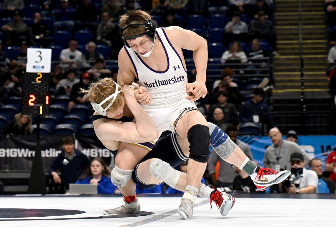 Penn State's Braeden Davis controls Northwestern’s Billy DeKraker during the 141-pound bout during the Big Ten wrestling championships at the Bryce Jordan Center on Sunday, March 8, 2026.