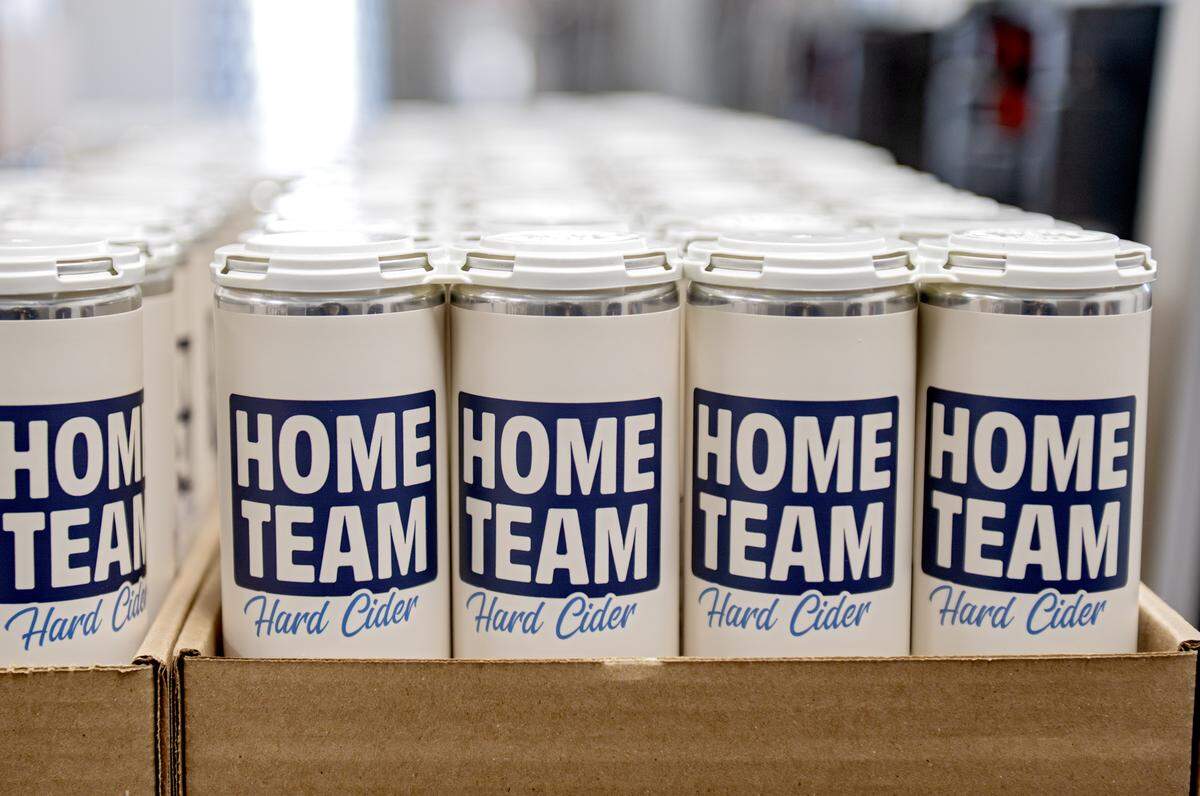 Cans of Home Team hard cider from University Wine Company.  