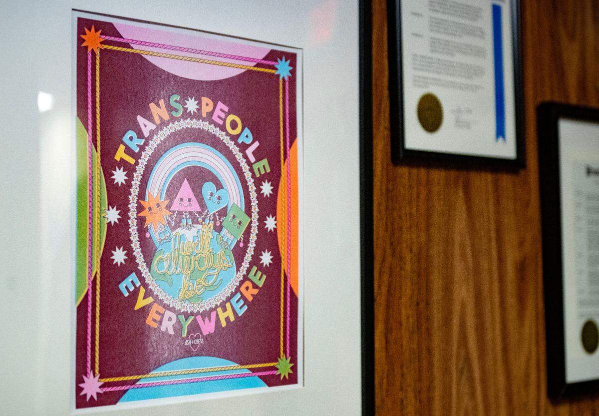 Artwork supporting the transgender community hangs on a wall at Centre LGBT+ on Thursday, Feb. 20, 2025.