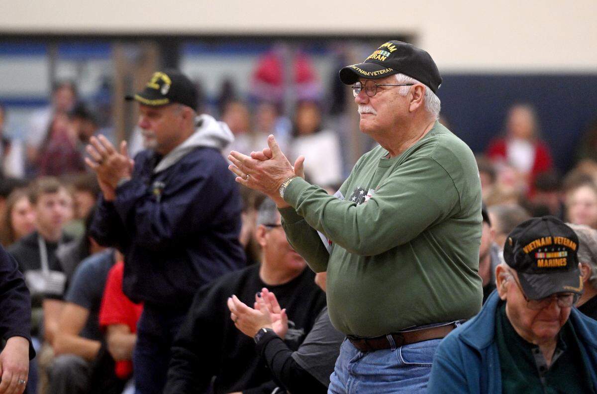 Veterans applaud the elementary students after they sang “American the Beautiful” and “You’re a Grand Old Flag” during the Bald Eagle Area school District’s Veterans Day celebration on Thursday, Nov. 9, 2023.
