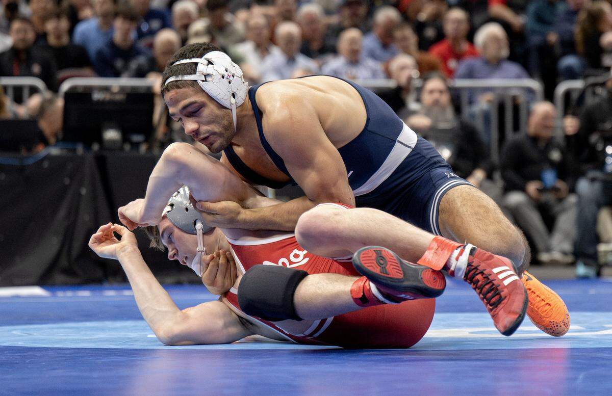 Penn State's Shayne Van Ness controls Nebraska’s Chance Lamer in a 149-pound semifinal bout of the NCAA wrestling championships on Friday, March 20, 2026.