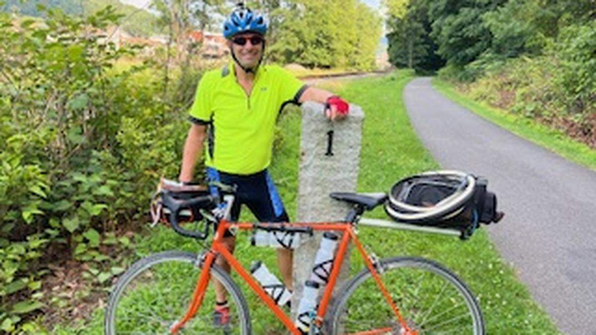 Marc Warren at the 1 mile marker to Greater Allegheny Passage trail’s end in Cumberland, Maryland.