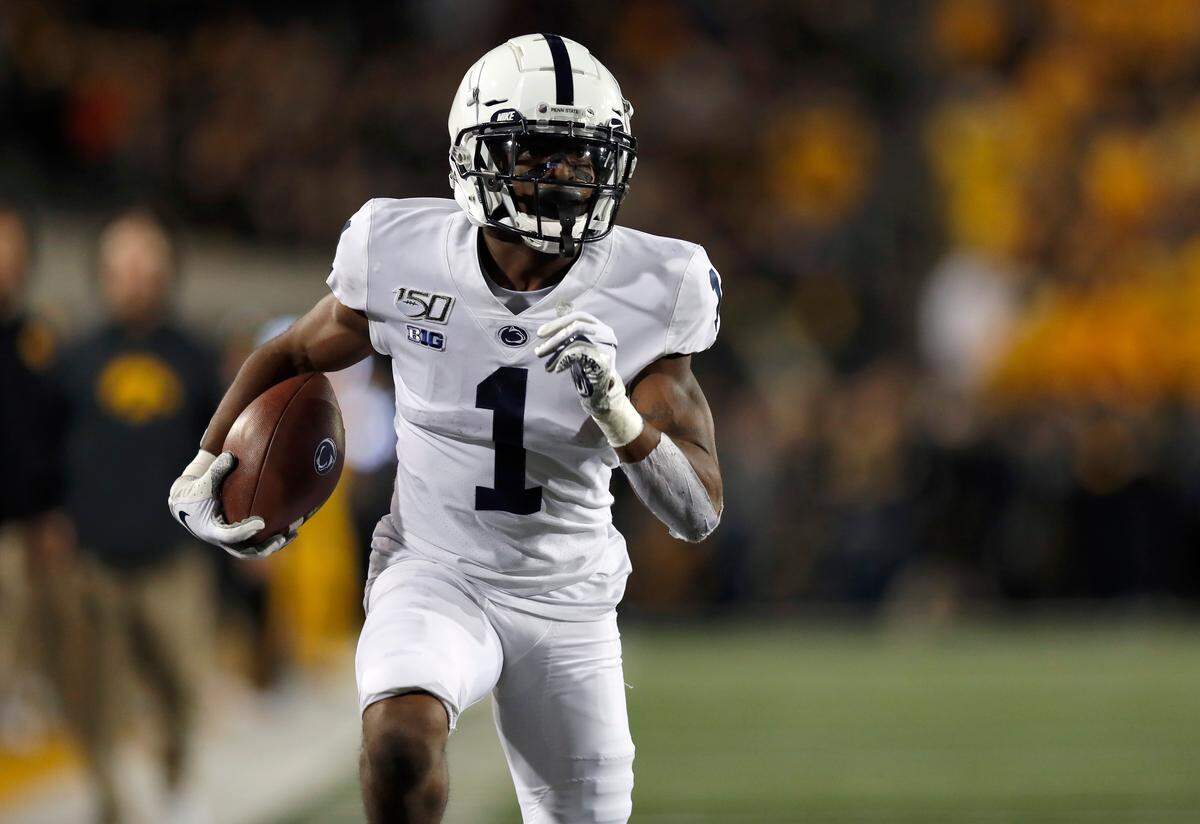 Penn State wide receiver KJ Hamler runs the ball in for a touchdown during the first half of the team’s NCAA college football game against Iowa on Saturday, Oct. 12, 2019, in Iowa City, Iowa. (AP Photo/Matthew Putney)