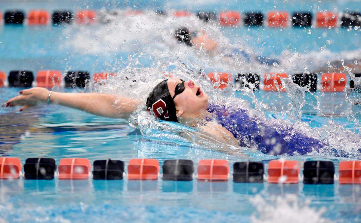 State College’s Jade Castro competes in the 100 yard backstroke finals during the PIAA swimming championships at Bucknell on Thursday, March 17, 2022. Castro finished in second with a time of 54:33.