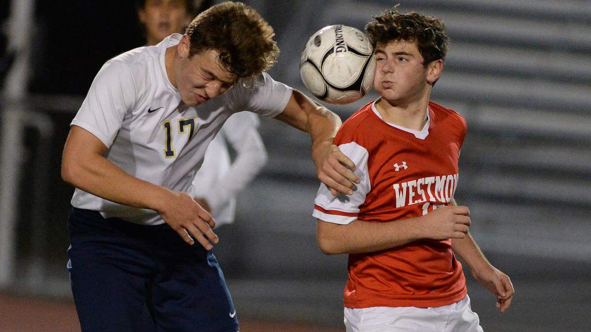 Bald Eagle Area’s Matt Knepp (left) collides with Westmont Hilltop’s Elijah Ellsworth while attempting to advance the ball up-field in late second half action Thursday at Altoona’s Mansion Park