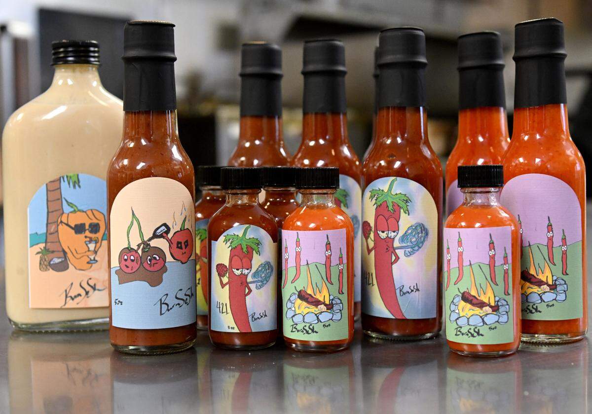 Some of the homemade sauces by George Salgado include Pina Colada Habanero, Choco Cherry Blaze, Smoked Chipotle Raspberry 421 and Roasted Peri.