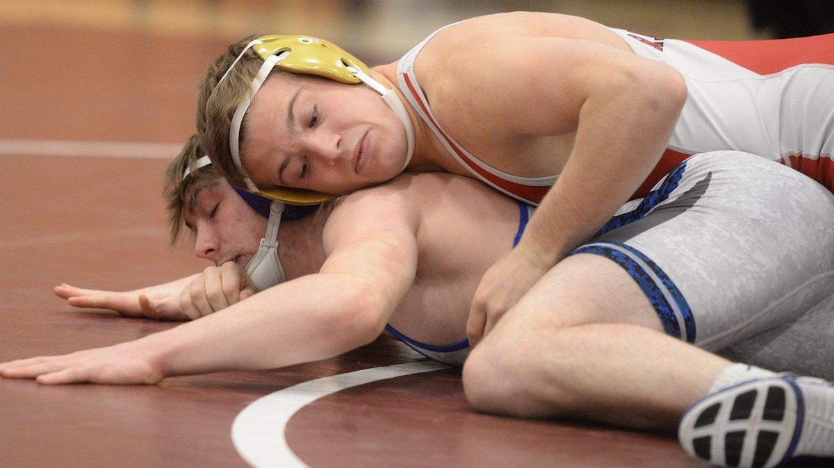 Bellefonte’s Ethan Richner (top) quickly pins Central Mountain’s Kaden Falls in District VI AAA wrestling action at 160 lbs Saturday afternoon at Altoona Area High School.