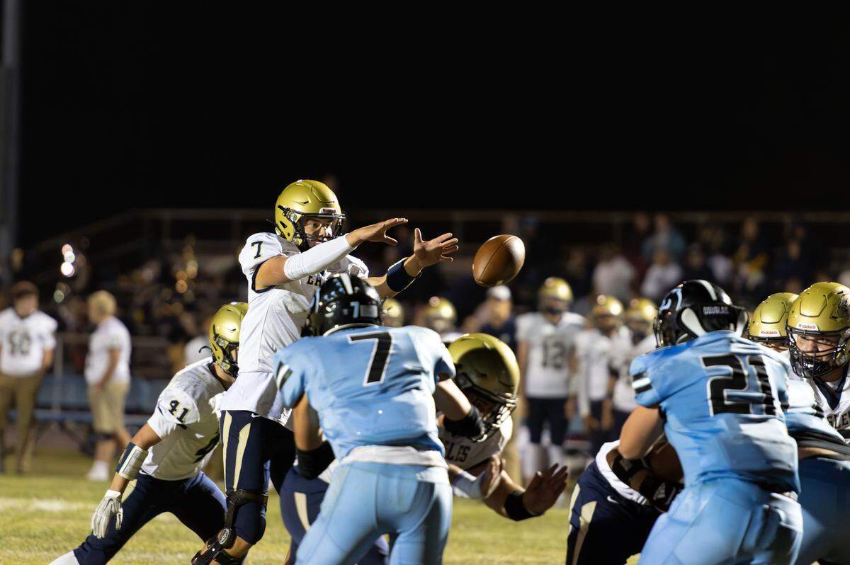 Bald Eagle Area quarterback Kaleb Irion (7) takes a snap at Penn Cambria High School in Cresson, Pa., on Friday, Aug. 29, 2025. The Panthers beat the Eagles 47-24.