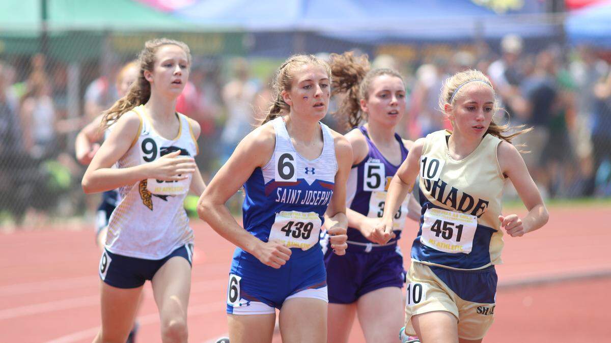 St. Joseph’s Sera Mazza, second from left, helped the Lady Wolves finish seventh as a team Saturday in the PIAA Class 2A Girls’ Track and Field Championships at Shippensburg’s Seth Grove Stadium.