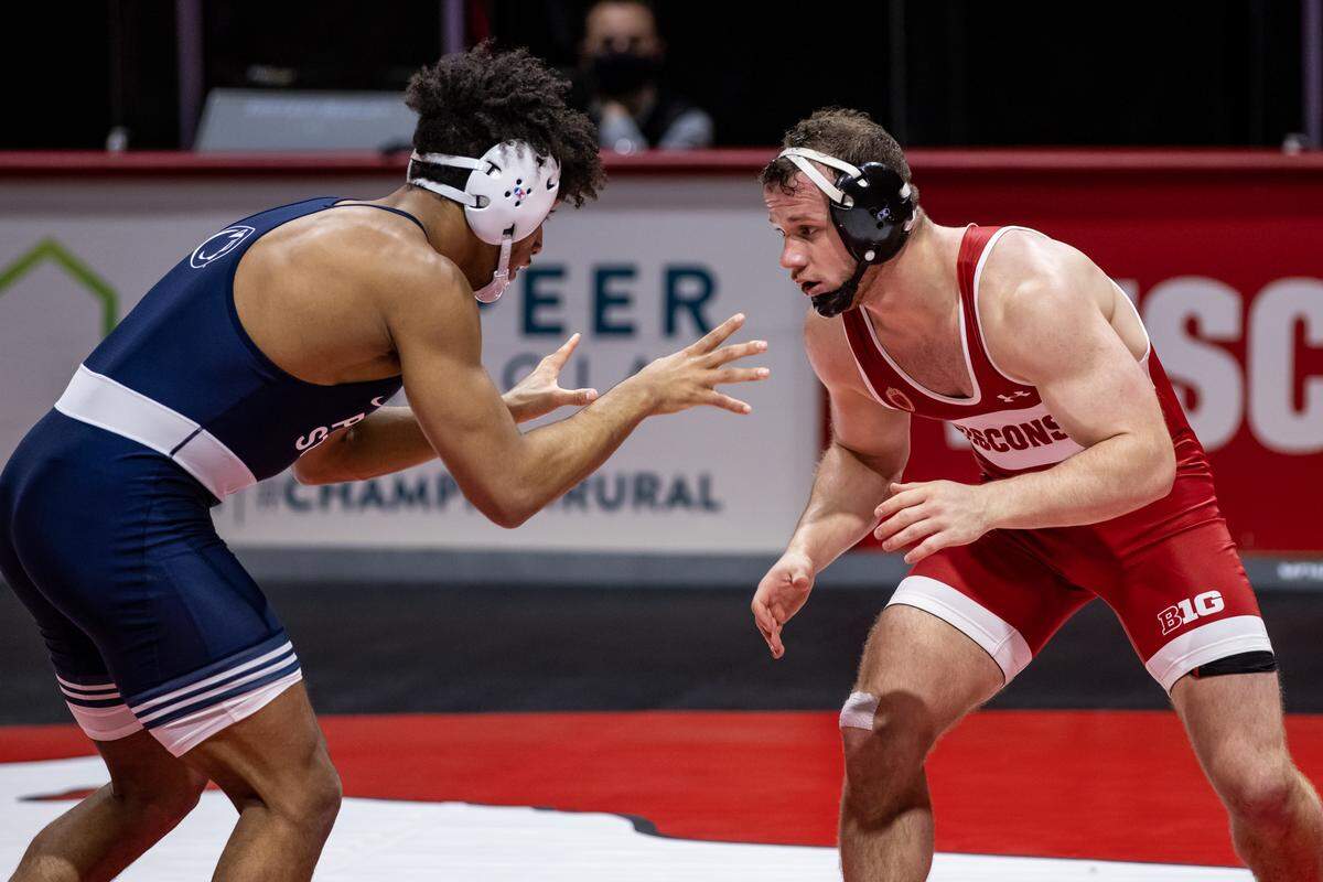 Penn State’s Carter Starocci looks for an opening on Wisconsin’s Jared Krattiger during their 174-pound bout on Tuesday during the Nittany Lions’ 34-6 win. Starocci topped Krattiger 5-3.