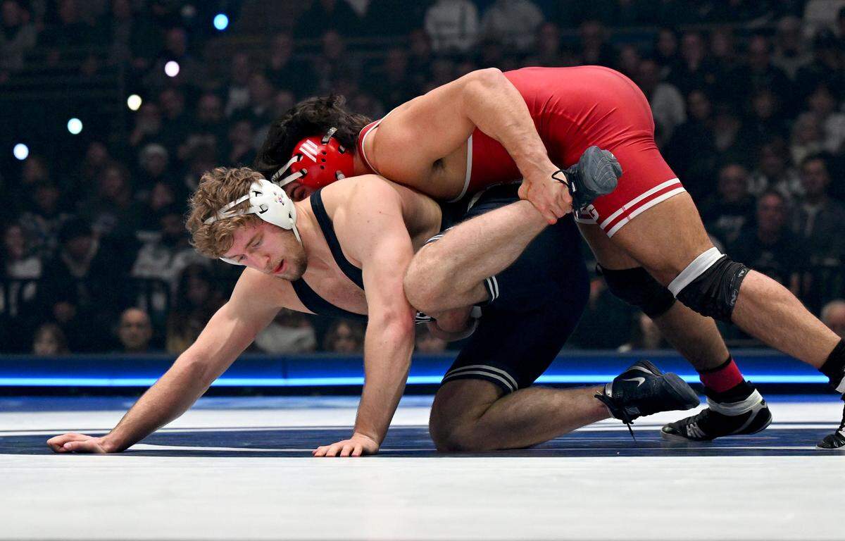 Penn State’s Cole Mirasola tries to get away from Nebraska’s AJ Ferrari during the 285 lb bout of the match on Friday, Jan. 30, 2026.