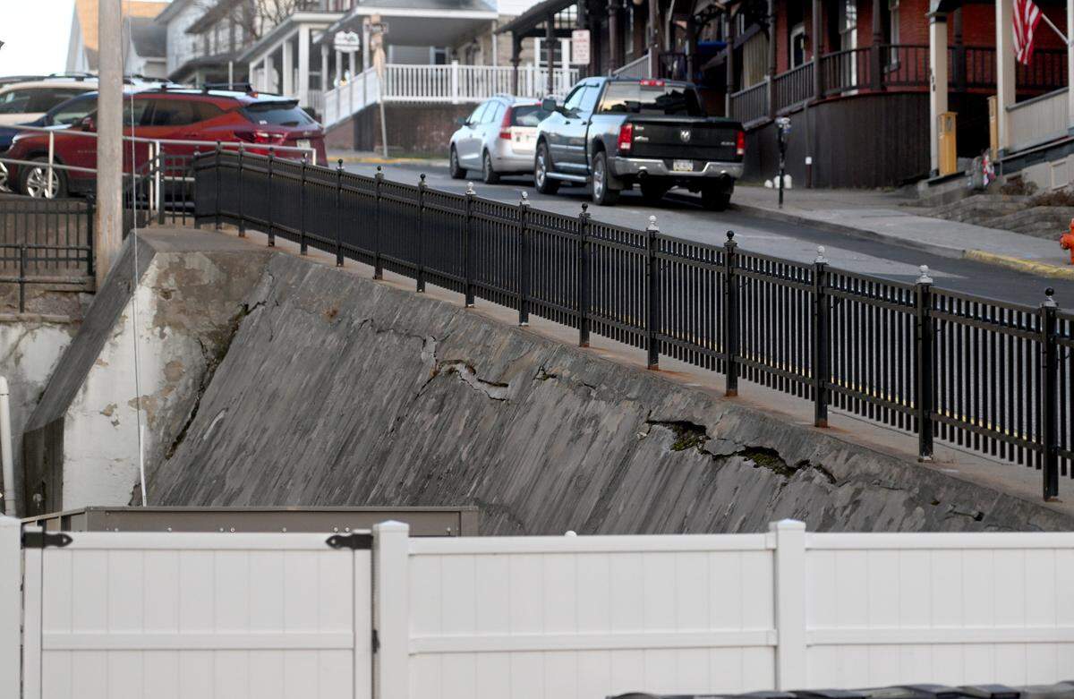 The retaining wall between the Centre County Courthouse and High Street on Tuesday, Dec. 13, 2022. The cracks seen here have since been repaired, but the county says cracks continue to be an issue after said repairs. According to the contractor, its engineer said any existing cracks appear consistent with typical dry shrinkage cracking on concrete.