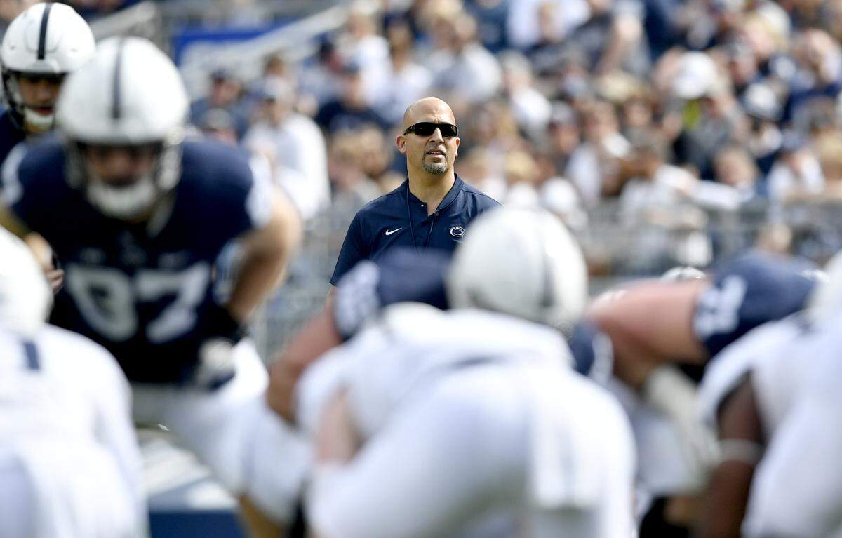 Penn State football coach James Franklin watches players during the Blue-White Games on Saturday, April 13, 2019.