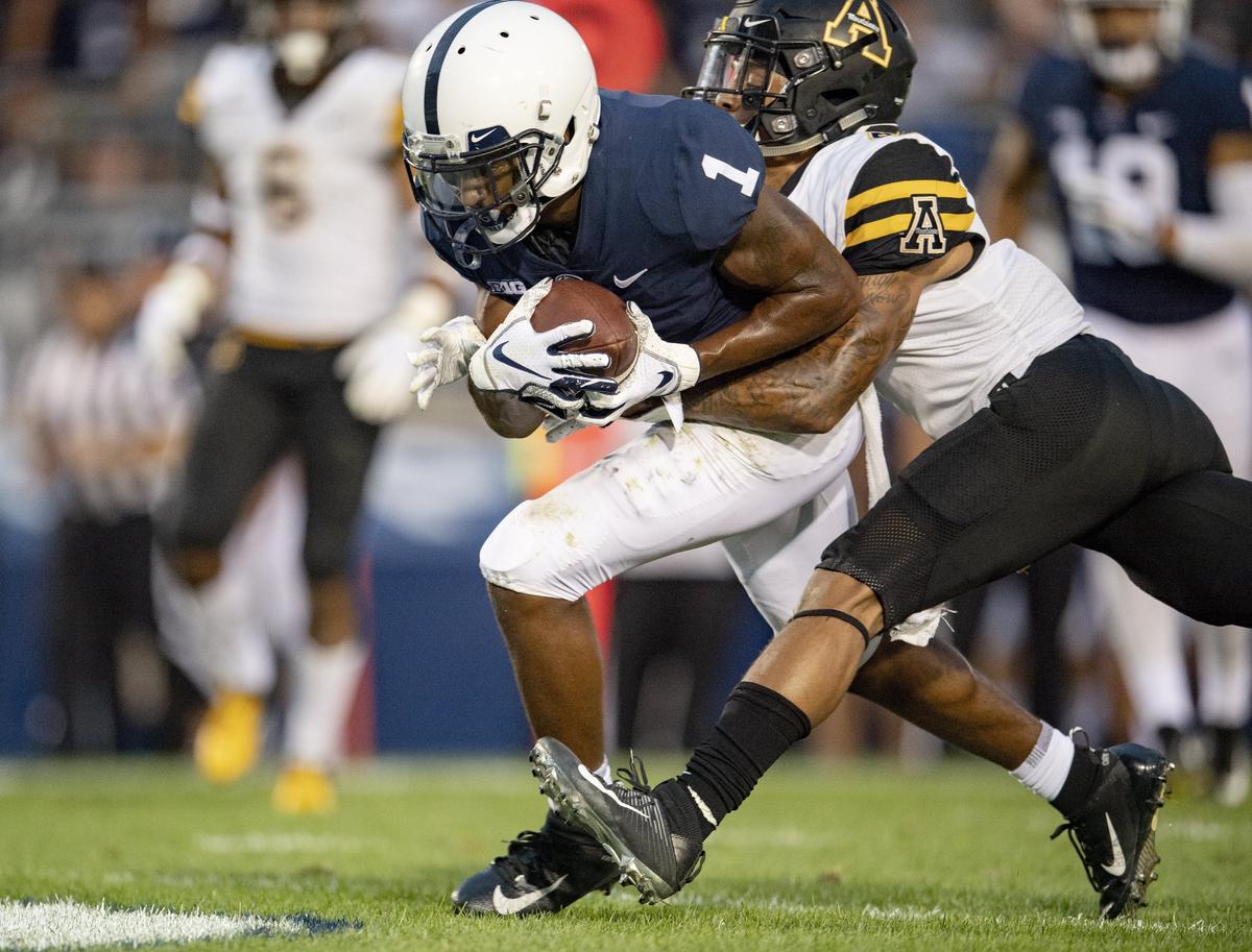 Penn State wide receiver KJ Hamler gets a touchdown ahead of an Appalachian State defender during the Saturday, Sept. 1, 2018 game at Beaver Stadium.