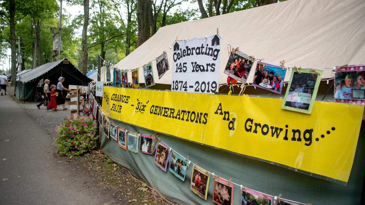 Visitors walk through the tent area at the 2019 Centre County Grange Encampment and Fair.