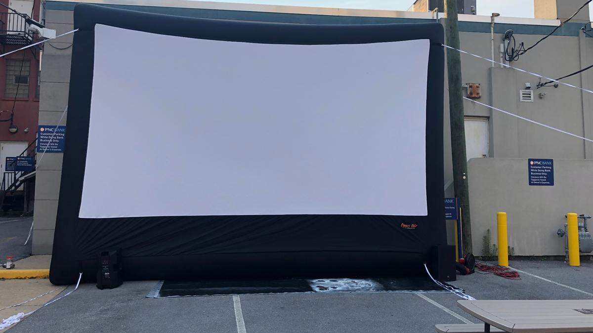 The State College Downtown Improvement District performed a dry-run Thursday with their screen and sound system, with everything checking out. The first free movie for “Downtown Family Flicks” will be shown Tuesday night at dusk on Calder Way.