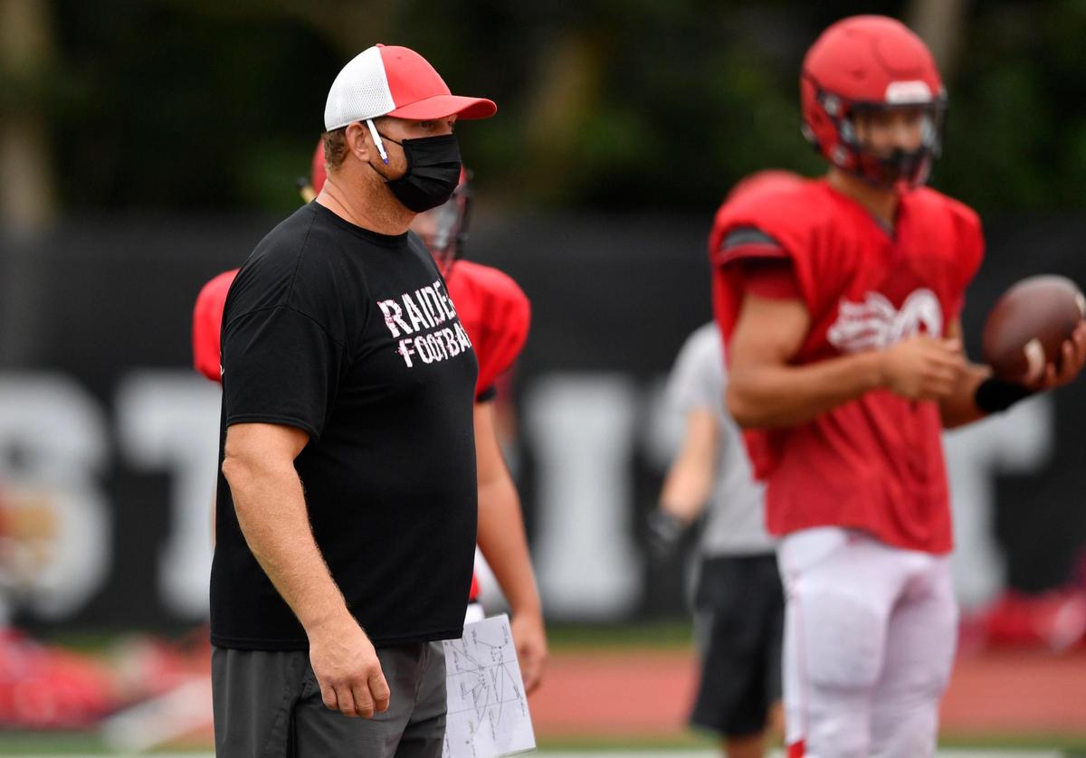 Bellefonte football coach Shanon Manning talks to his players during practice on Thursday, Sept. 3, 2020.