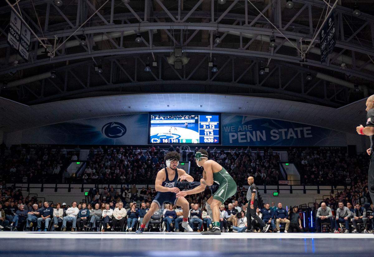 Penn State’s Beau Bartlett wrestles Michigan State’s Jaden Crumpler in the 141 lb bout of the match on Friday, Jan. 10, 2025 in Rec Hall. Bartlett won by major decision, 12-3.