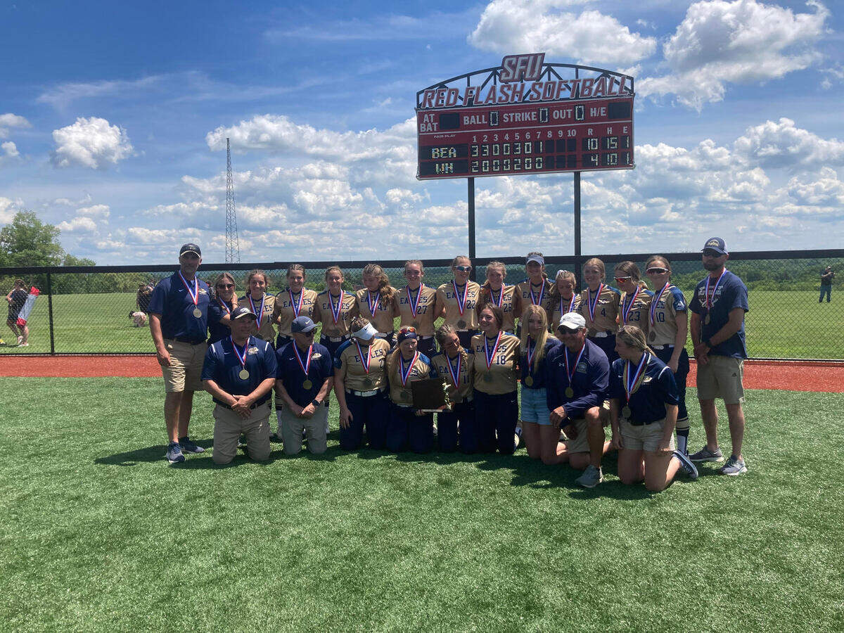 Bald Eagle won the 2022 District 6 Class 6A championship over Westmont-Hilltop 10-4. The Lady Eagles pose for pictures with their trophy in-hand.
