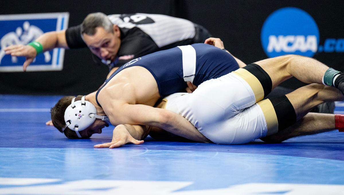 Penn State’s Luke Lilledahl pins Purdue’s Matt Ramos in the 125-pound third place bout of the 2025 NCAA Wrestling Championships in Philadelphia’s Wells Fargo Center on Saturday, March 22, 2025.