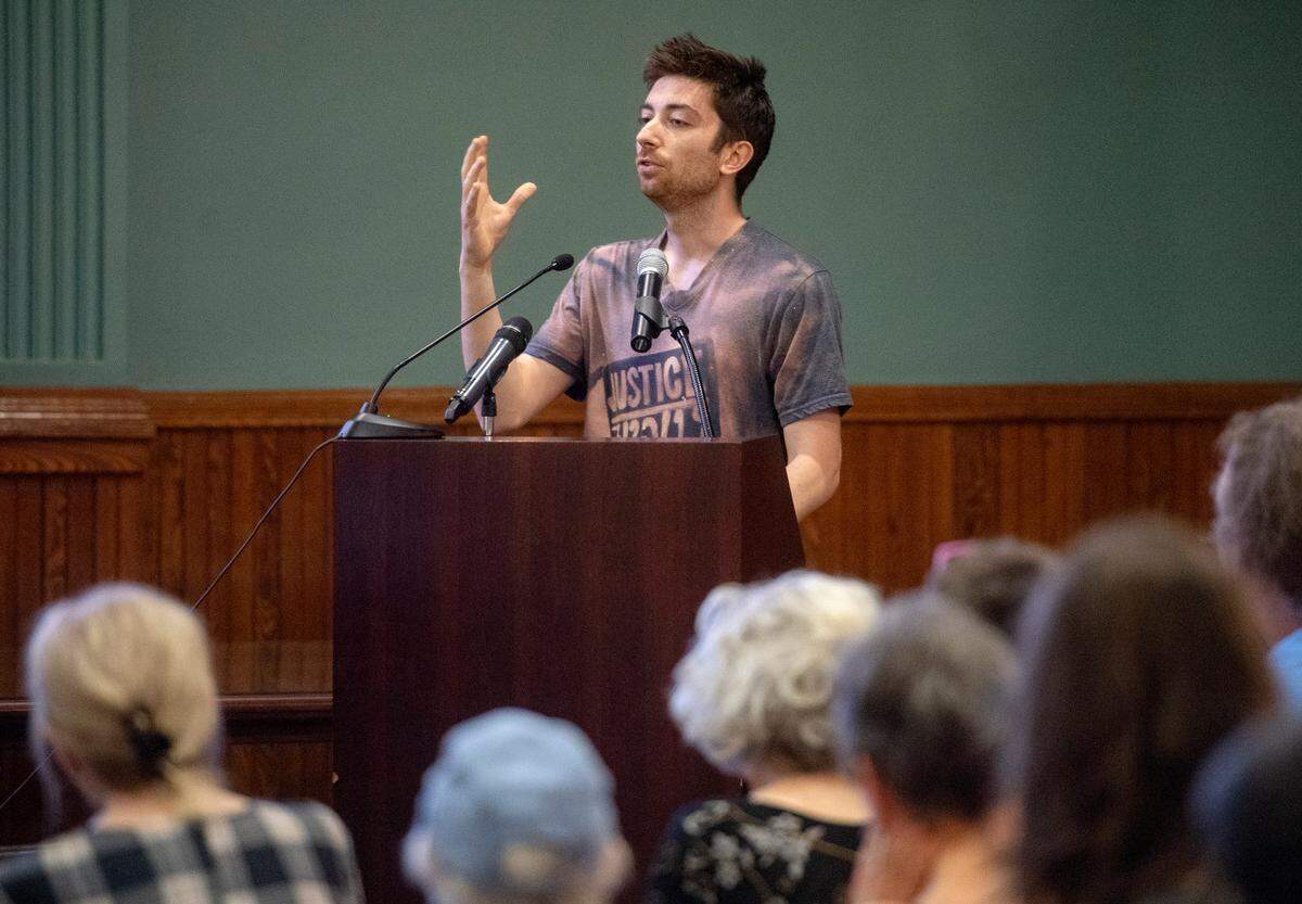 Evan Higgins speaks about his want for the police to be held accountable during the Centre County Board of Commissioners hosted community conversation about mental health services in Centre County on Thursday, June 27, 2019.  
