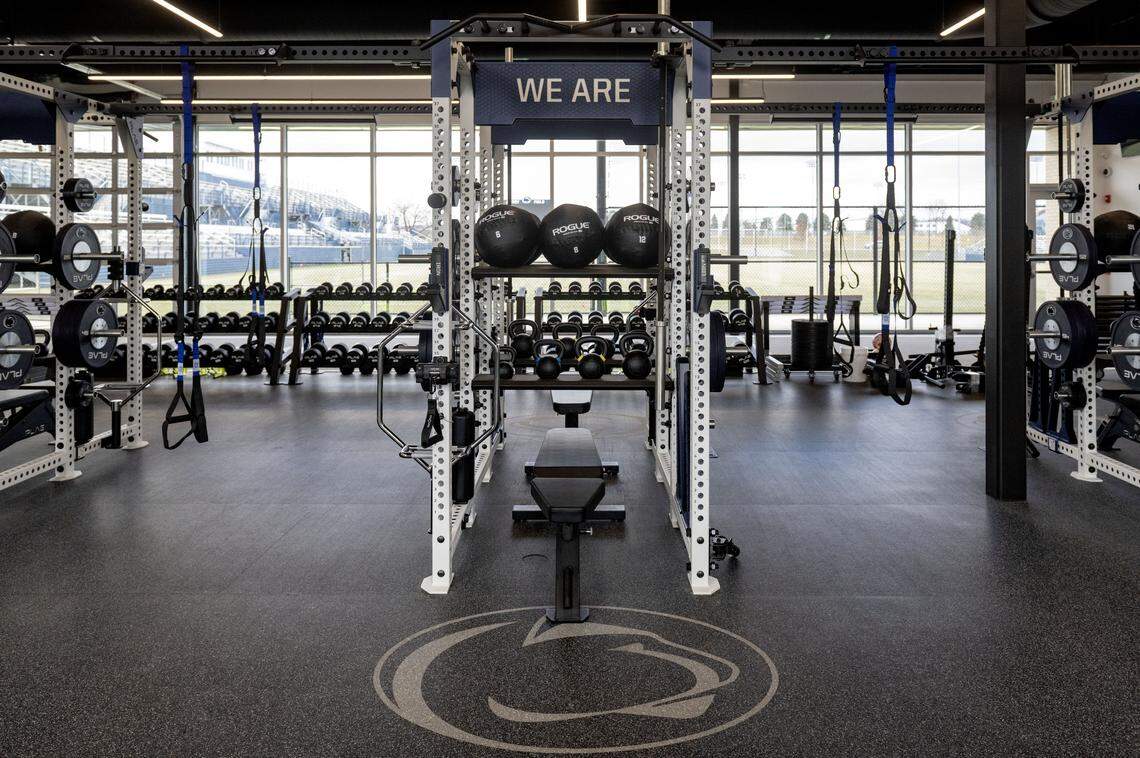 The weight room from the Penn State soccer teams overlooks the playing field at the new Jeffrey Field Soccer Complex. 